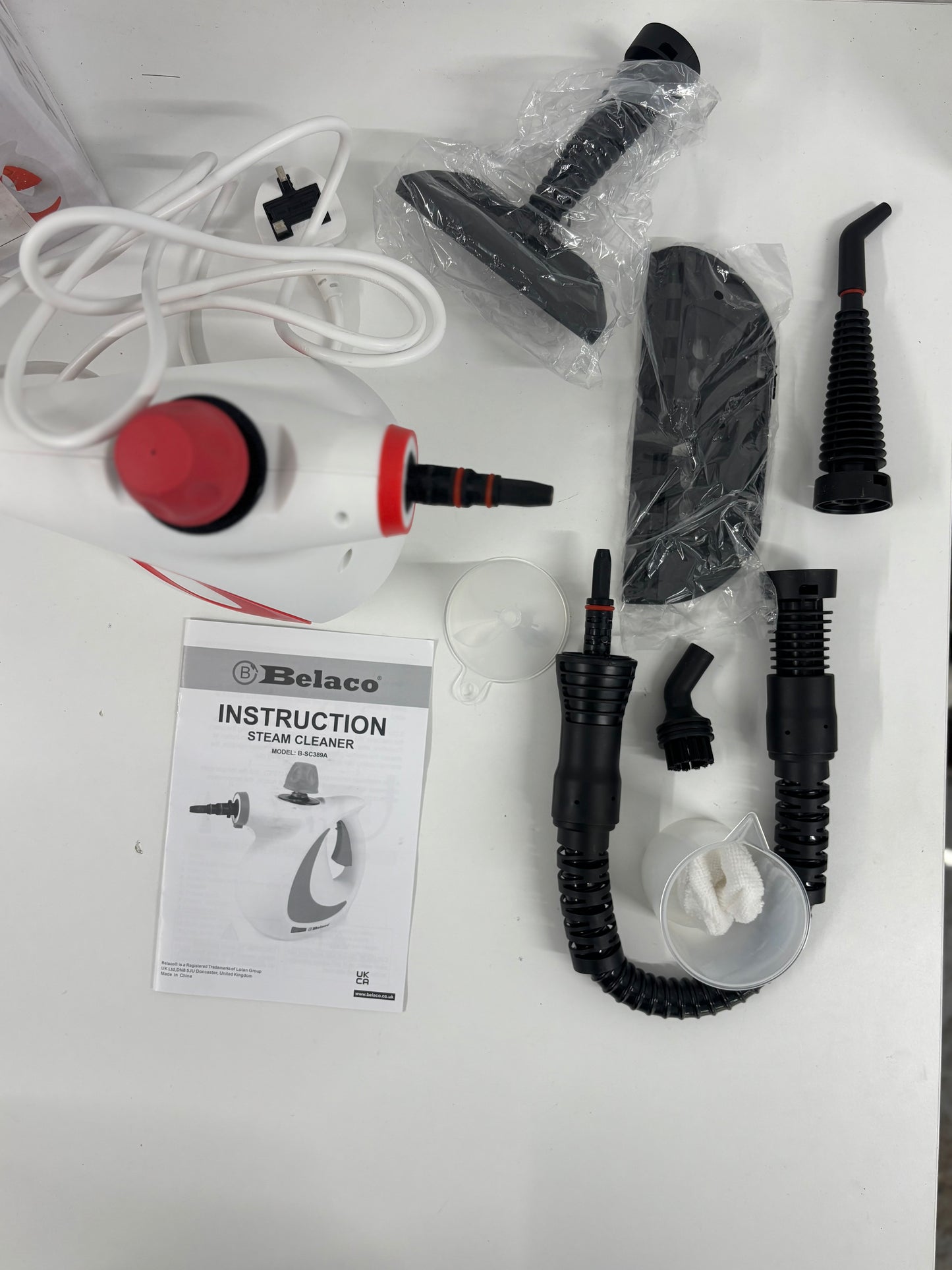 Hand held steam cleaner